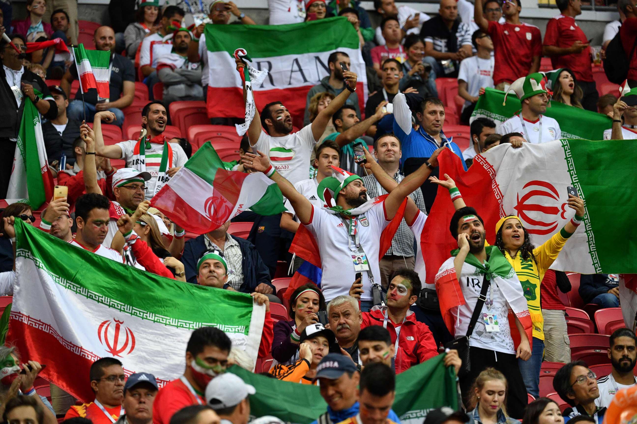 PHOTO: Iran supporters cheer during the Russia 2018 World Cup Group B football match between Iran and Spain at the Kazan Arena in Kazan, June 20, 2018.