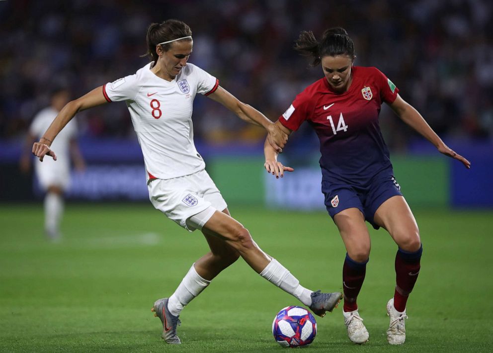 PHOTO: Jill Scott of England is challenged by Ingrid Syrstad Engen of Norway during the 2019 FIFA Women's World Cup France Quarter Final match between Norway and England at Stade Oceane on June 27, 2019, in Le Havre, France.