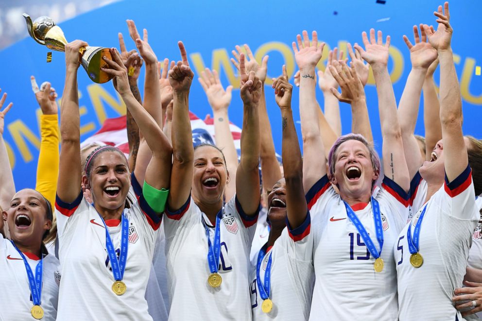 PHOTO: U.S. players celebrate with the trophy after the France 2019 Womens World Cup football final match between USA and the Netherlands, on July 7, 2019, at the Lyon Stadium in Lyon, central-eastern France.