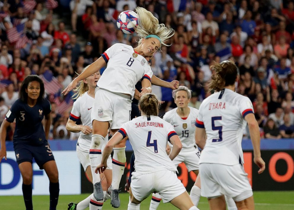 PHOTO: United States' Julie Ertz leaps to head the ball during the Women's World Cup quarterfinal soccer match between France and the United States at Parc des Princes in Paris, June 28, 2019. 