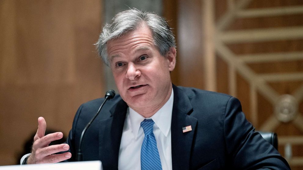 PHOTO: FBI Director Christopher Wray testifies before a Senate Homeland Security and Governmental Affairs Committee hearing to discuss security threats 20 years after the 9/11 terrorist attacks, Sept. 21, 2021, on Capitol Hill in Washington.