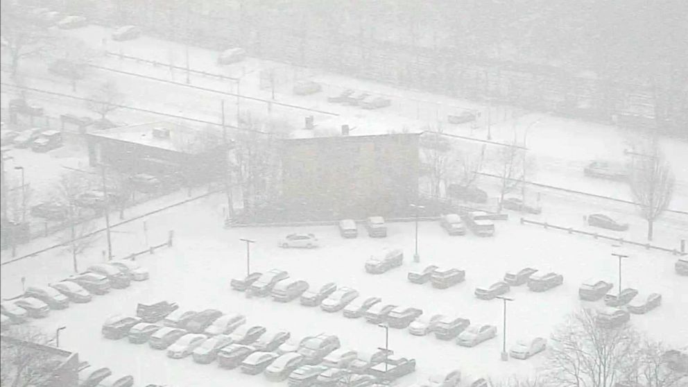 Snow blankets a Connecticut parking lot, Feb. 12, 2019.