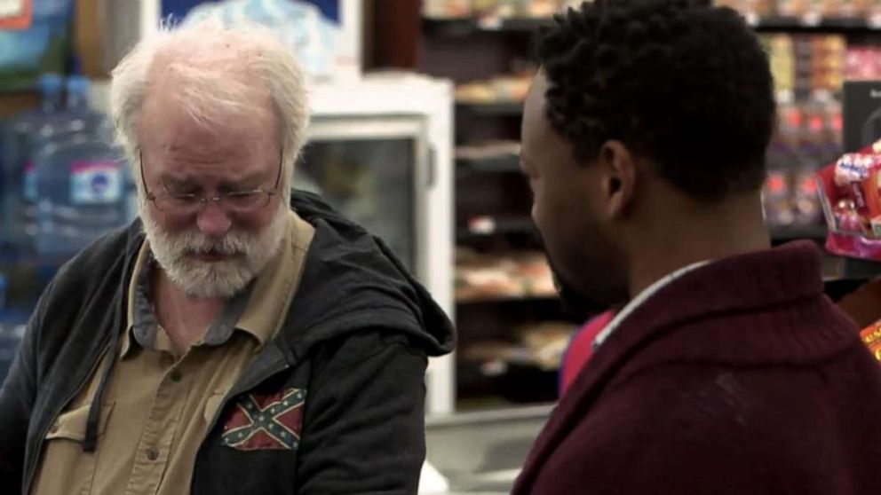 PHOTO: In a New York grocery store, "WWYD" actor Phil Baker explains to "WWYD" actor Gabriel Lawrence why he’s wearing a jacket with a Confederate flag.