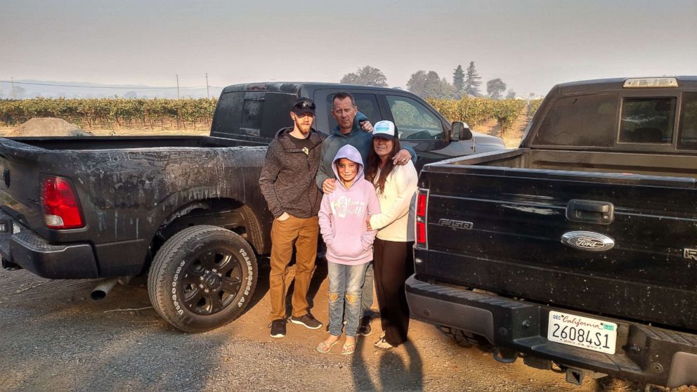 PHOTO: Charlie Yates, left, and his family gathered what they could in their trucks in a rush to escape the fires. During the drive, Charlie’s truck caught on fire and he had to abandon it.