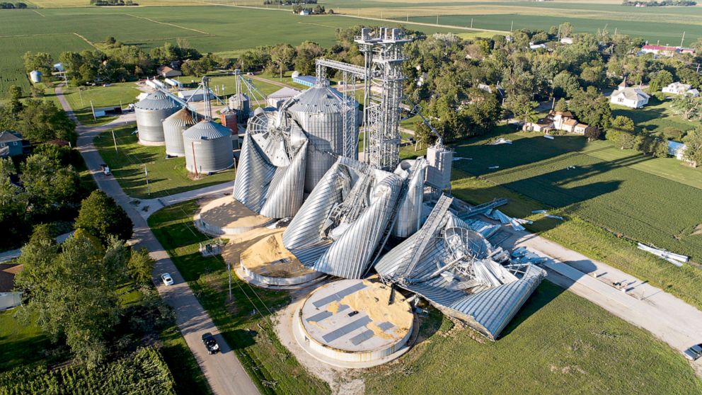 PHOTO: Grain bins at the Heartland Co-op grain elevator lay damaged by a powerful storm that battered the region in Luther, Iowa, Aug. 11, 2020.