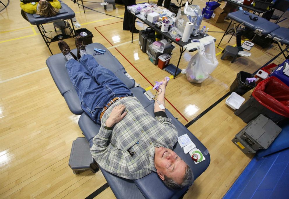 PHOTO: Gary Smith, of Uniondale, donates blood during a blood drive at the Carbondale YMCA in Carbondale, Pa., on Thursday, March 26, 2020.
