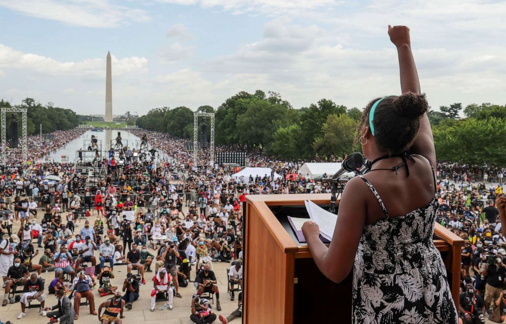 PHOTO: Yolanda Renee King, 12, the granddaughter of Rev. Martin Luther King Jr., thrusts her fist as she speaks to the "Get Your Knee Off Our Necks" Commitment March on Washington, Aug. 28, 2020, in Washington, D.C.