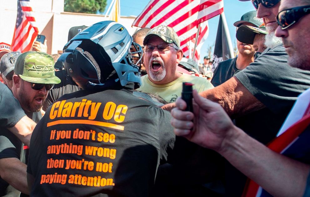 PHOTO: Black Lives Matter protesters and counter protesters clash in Yorba Linda, Calif., Saturday, Sept. 26, 2020. Police eventually declared the event an unlawful gathering and cleared the streets near Yorba Linda and Imperial. 