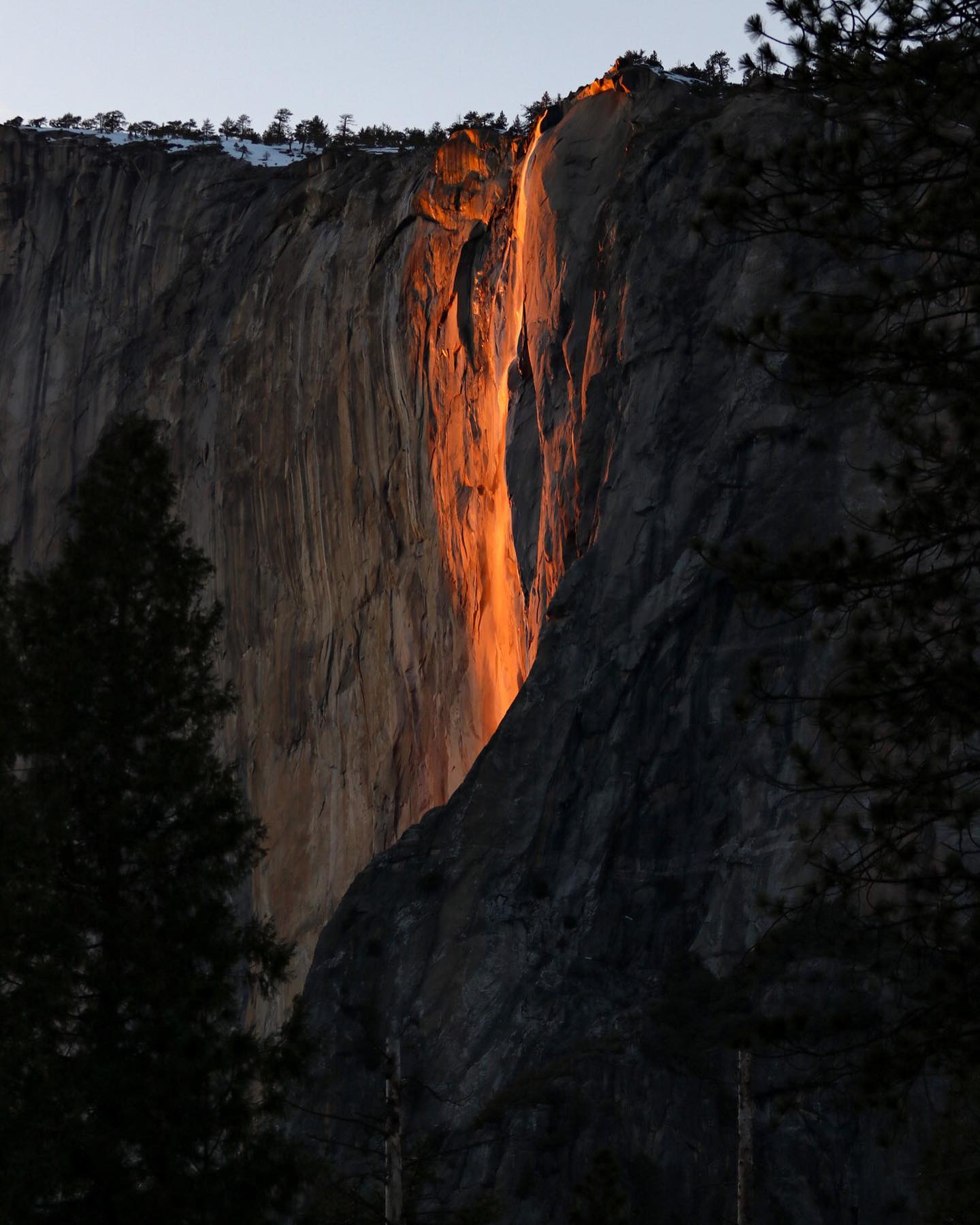 PHOTO: Horsetail Fall glows orange at sunset, Feb. 12, 2023.