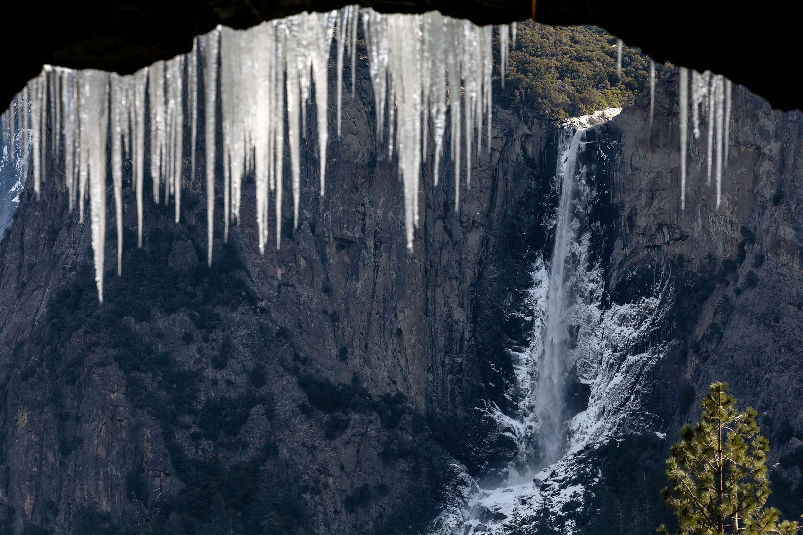 PHOTO: FILE - Ice is seen at waterfall in Yosemite National Park, Calif., Feb. 16, 2023.