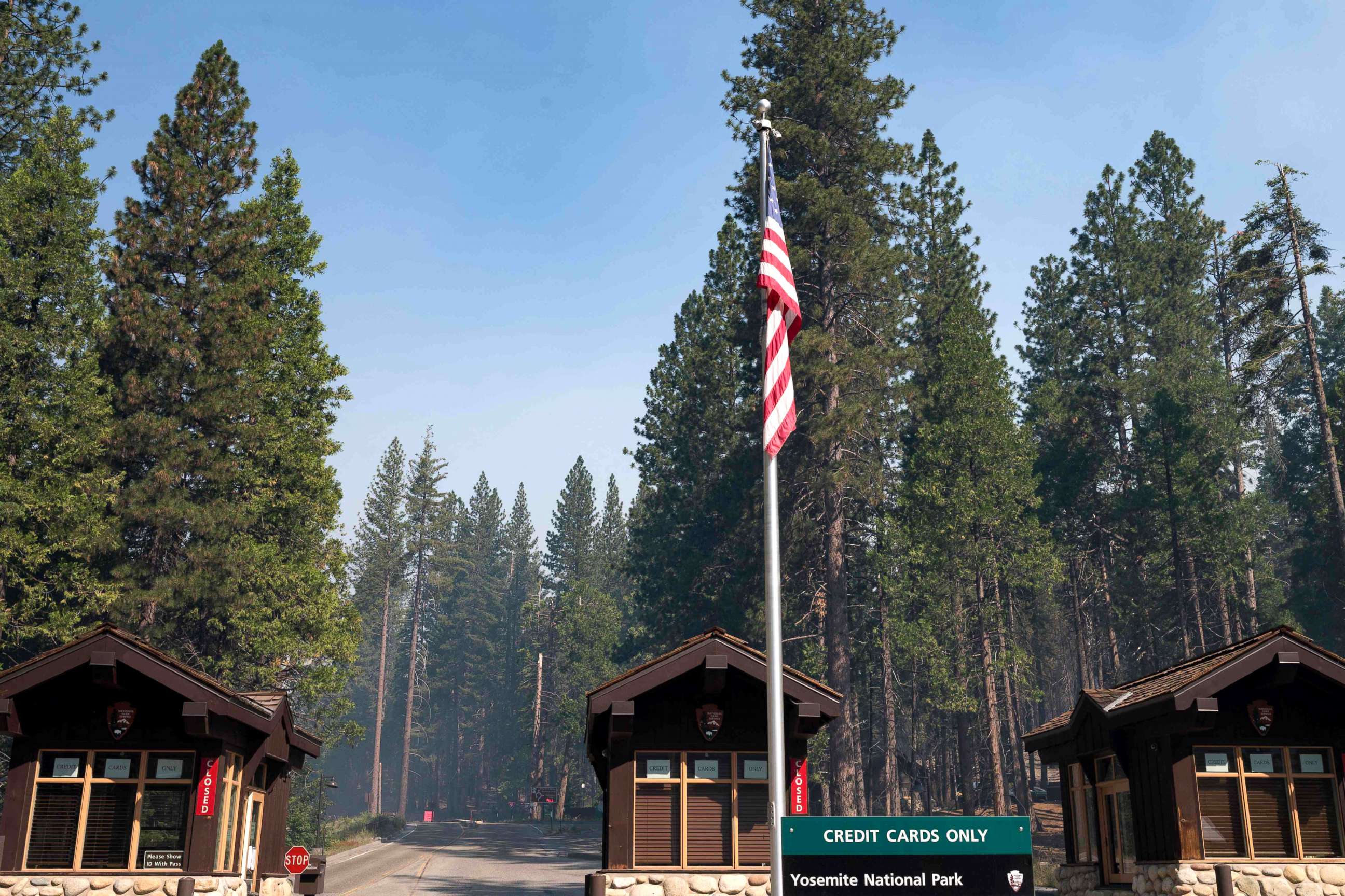 PHOTO: Smoke from the Washburn Fire hangs over the south entrance to Yosemite National Park, California, on July 12, 2022.