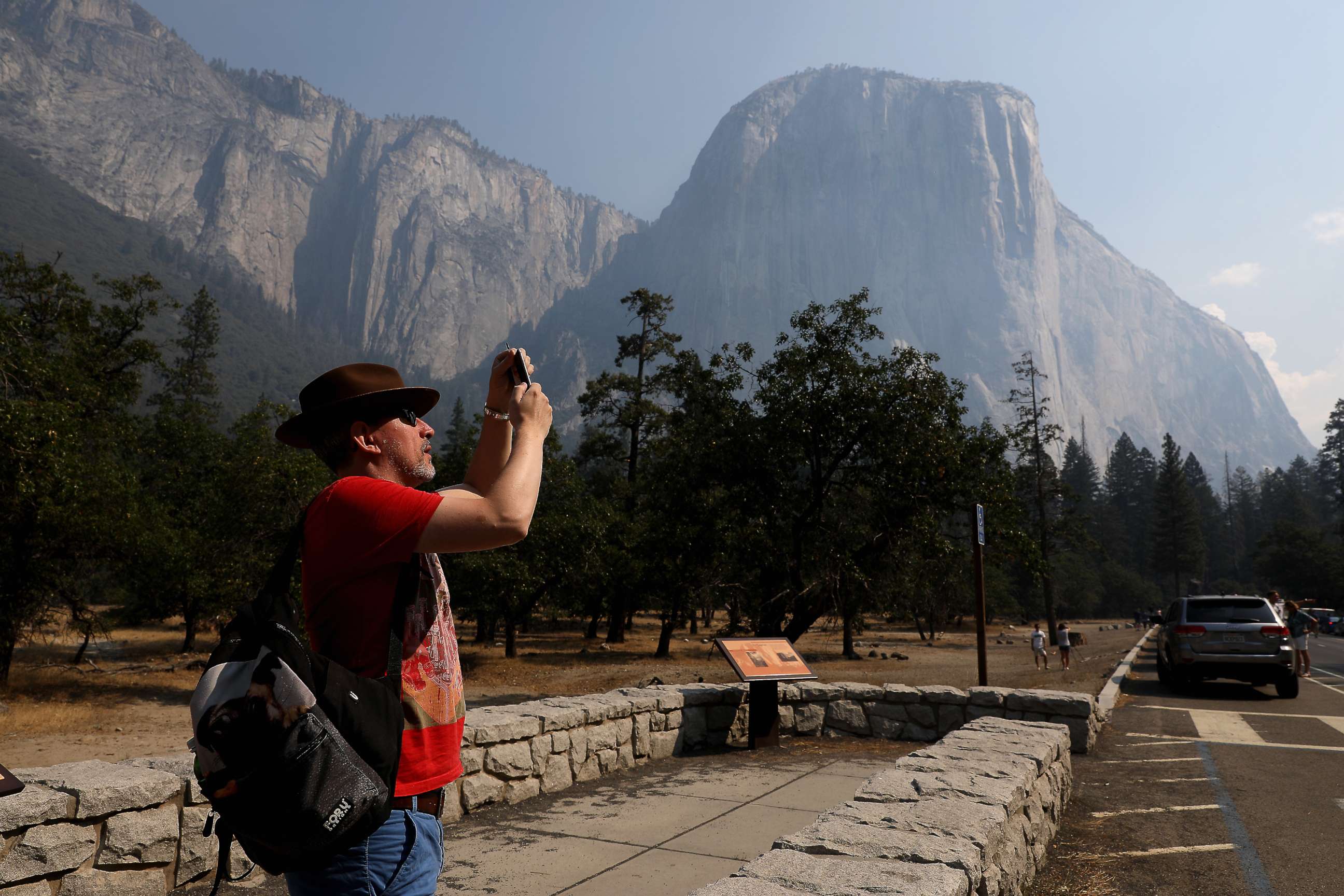 PHOTO: YOSEMITE VALLEY  CA AUGUST 14, 2018 -- Steve Maddison takes pictures near El Capitan in the Yosemite Valley, Aug. 14, 2018, after it reopened since being closed due to the Ferguson fire.