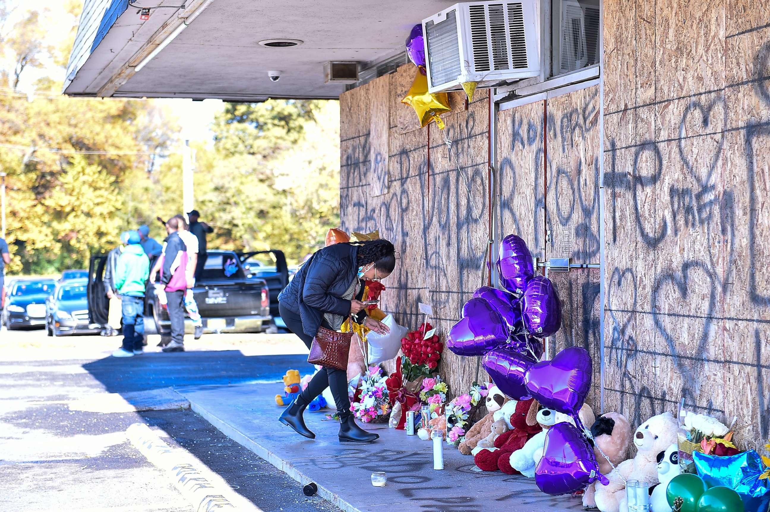 PHOTO: Fans of Young Dolph set up a memorial outside of Makeda's Cookies bakery on November 18, 2021, in Memphis.