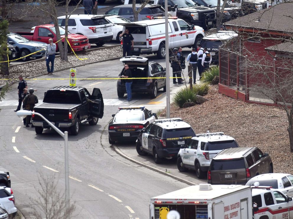 PHOTO: Law enforcement personnel gather near the scene where an active shooter has taken hostages at the Veteran Administration Hospital in Yountville, Calif., March 9, 2018.