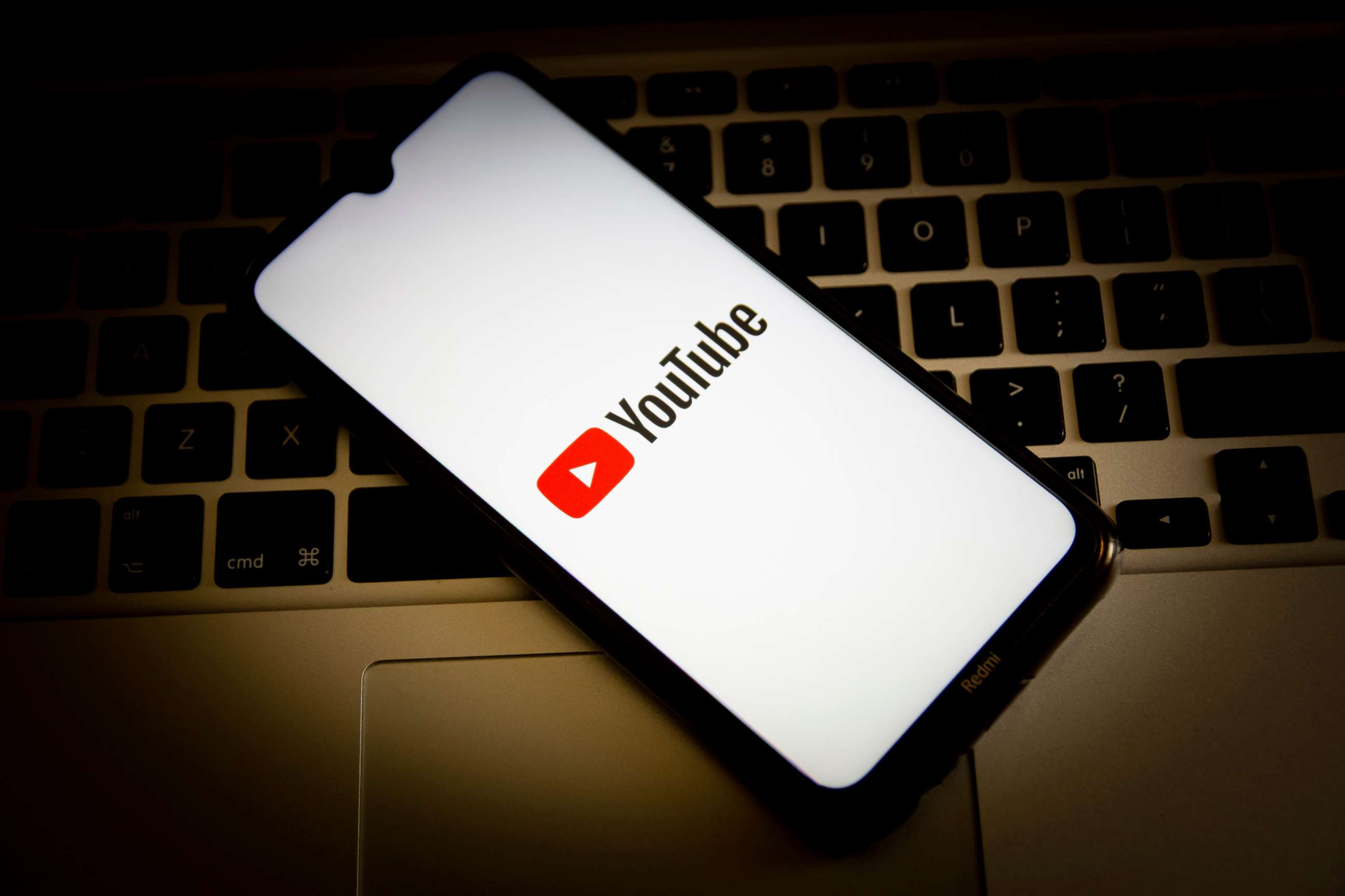 PHOTO: YouTube logo seen displayed on a smartphone screen.