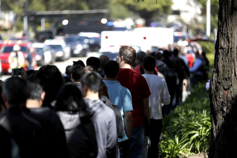 PHOTO: People evacuate from the YouTube headquarters after being released from the scene of an active shooting incident in San Bruno, Calif., April 3, 2018.