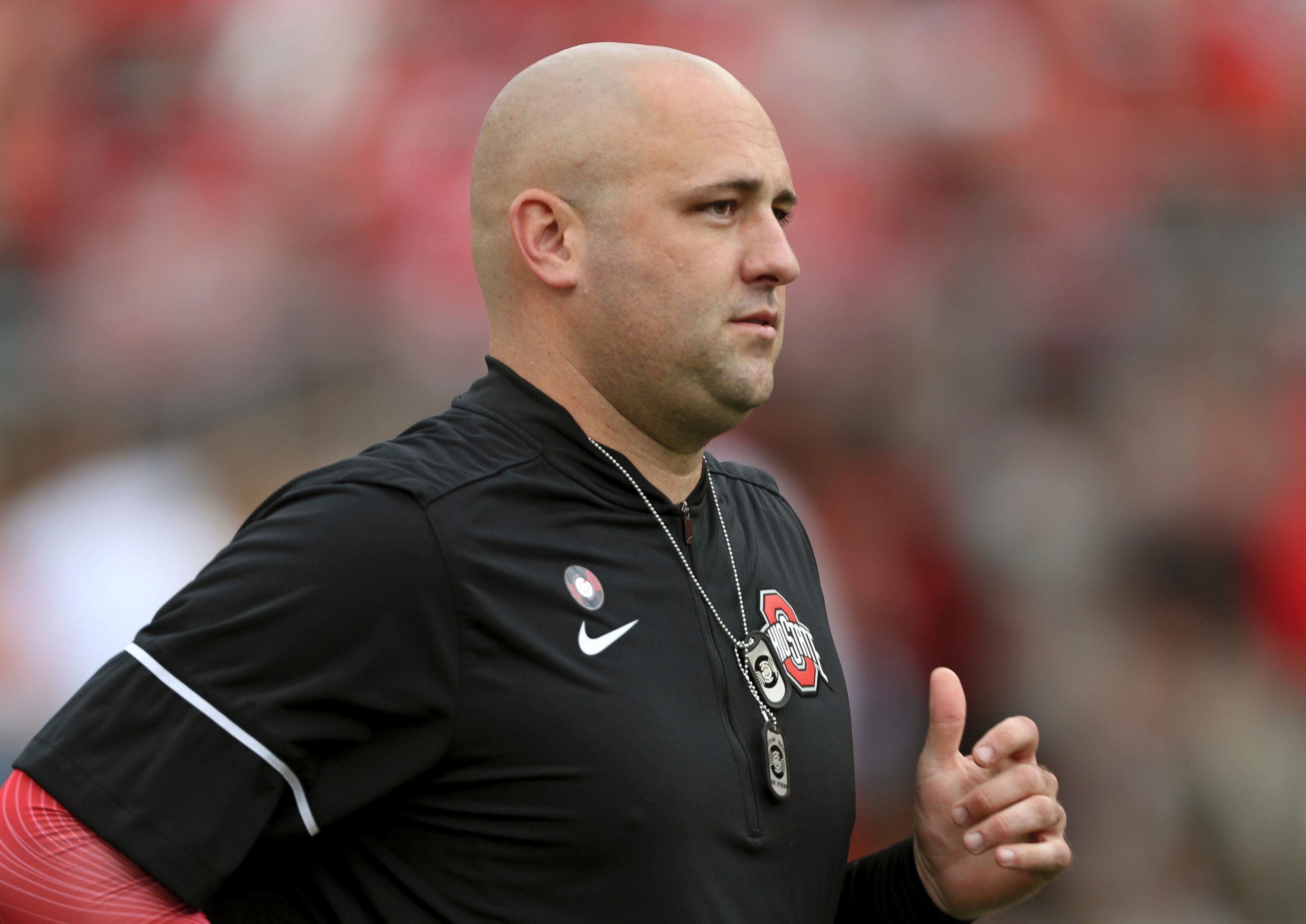 In this Sept. 16, 2017 photo, Ohio State assistant coach Zach Smith watches before the start of an NCAA college football game against Army in Columbus, Ohio.