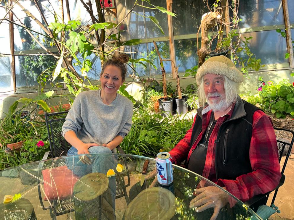 PHOTO: News Chief Meteorologist and Chief Climate Correspondent Ginger Zee sits with Earthship Biotecture founder and creator Michael Reynolds outside of an Earthship near Taos, New Mexico.