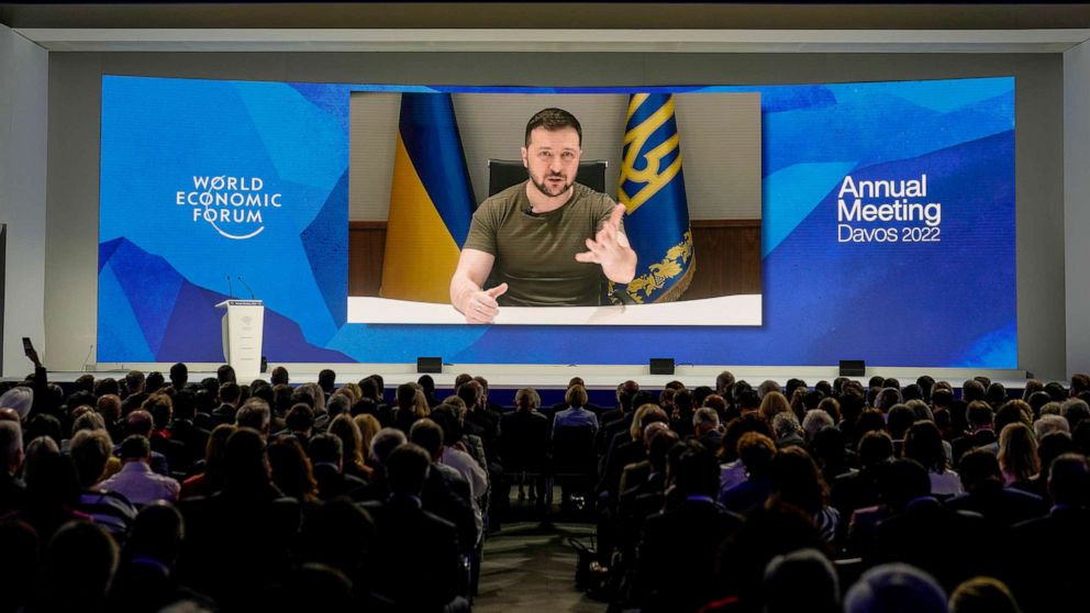 PHOTO: Ukrainian President Volodymyr Zelenskyy displayed on a screen as he addresses the audience from Kyiv on a screen during the World Economic Forum in Davos, Switzerland, May 23, 2022.