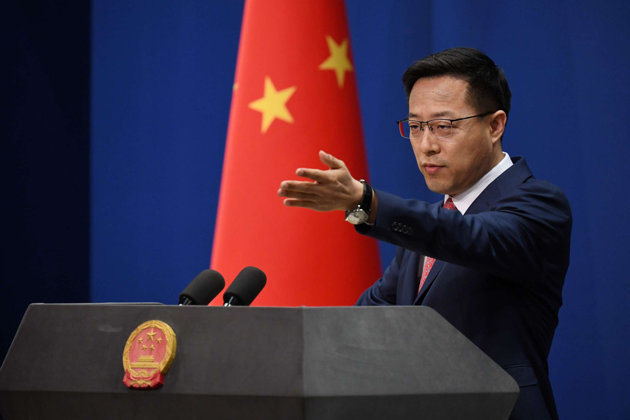 PHOTO: Chinese Foreign Ministry spokesman Zhao Lijian takes a question at the daily media briefing in Beijing on April 8, 2020.