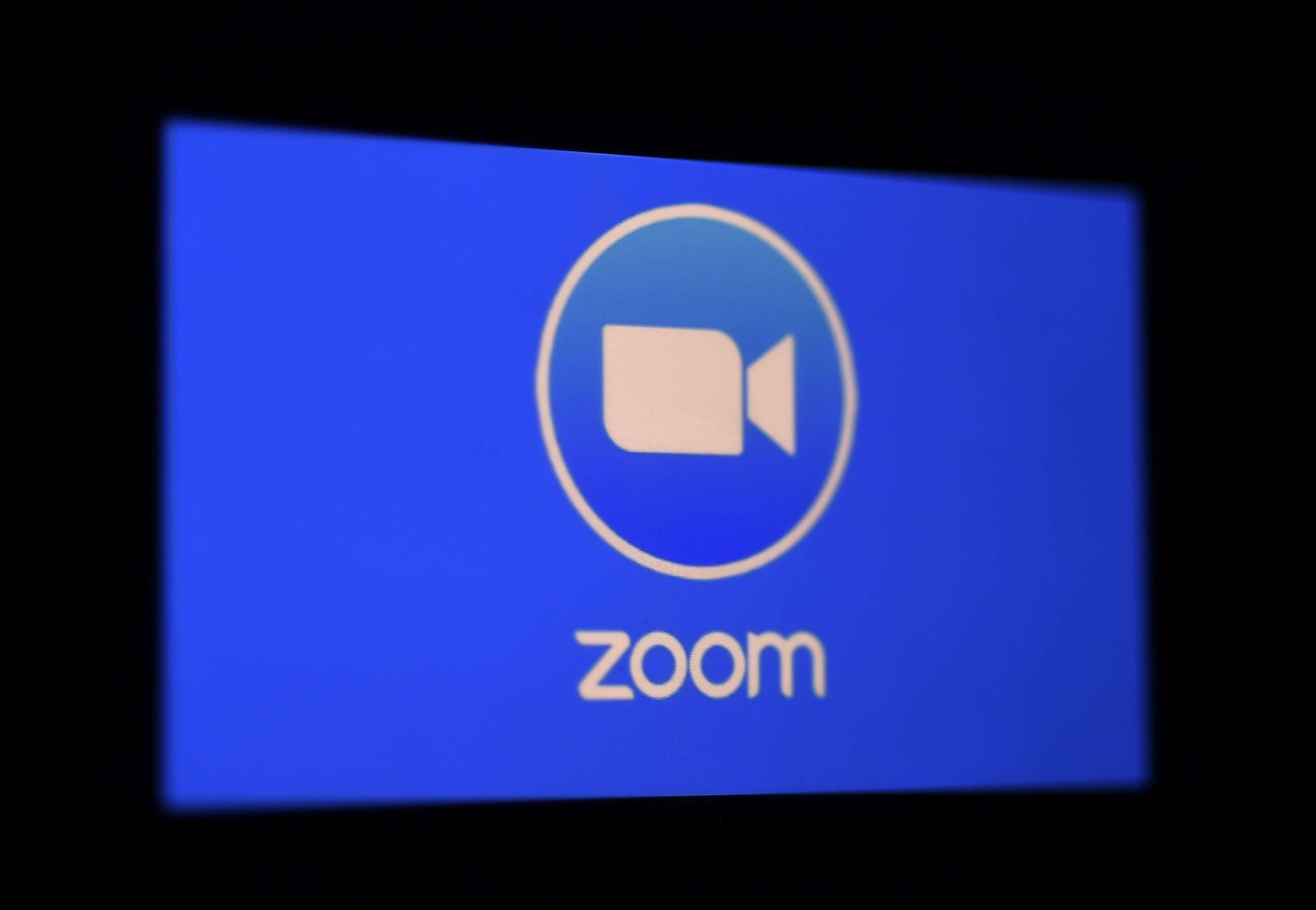 PHOTO: A photo illustration shows a Zoom App logo is displayed on a smartphone, March 30, 2020 in Arlington, Va.