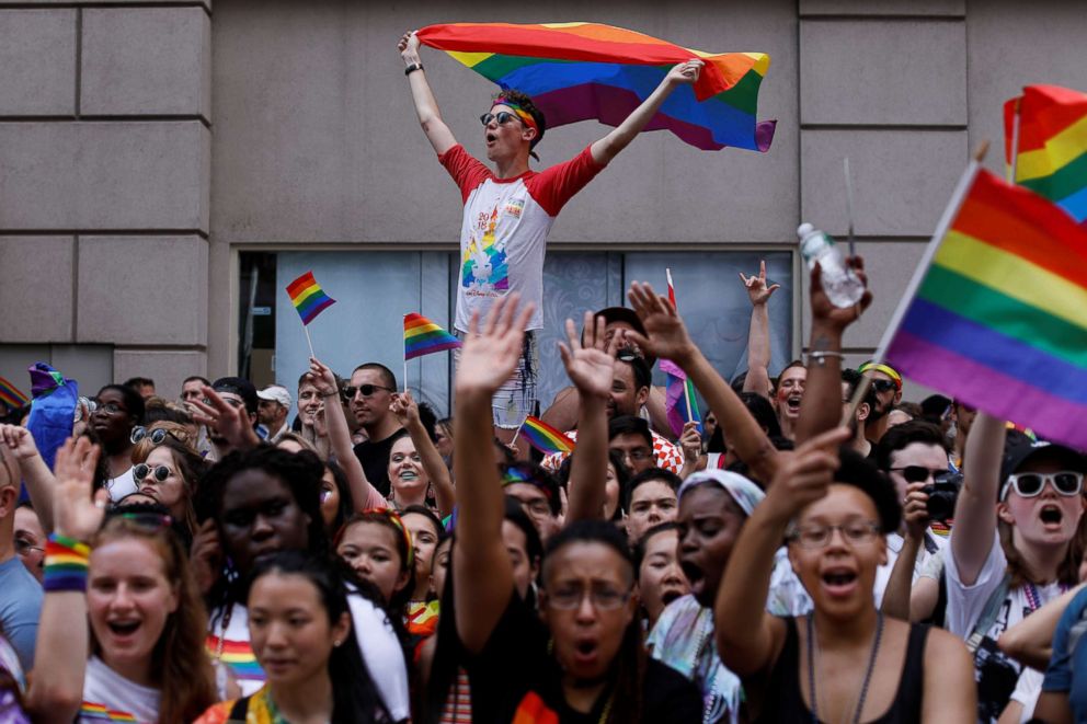 PHOTO: People cheer as they watch the 2018 New York City Pride Parade in New York, June 24, 2018.