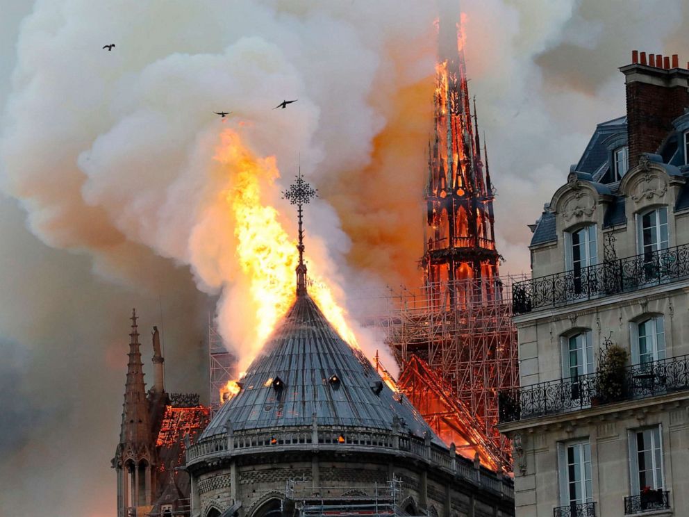 PHOTO: Smoke and flames rise during a fire at the Notre-Dame Cathedral in central Paris on April 15, 2019.