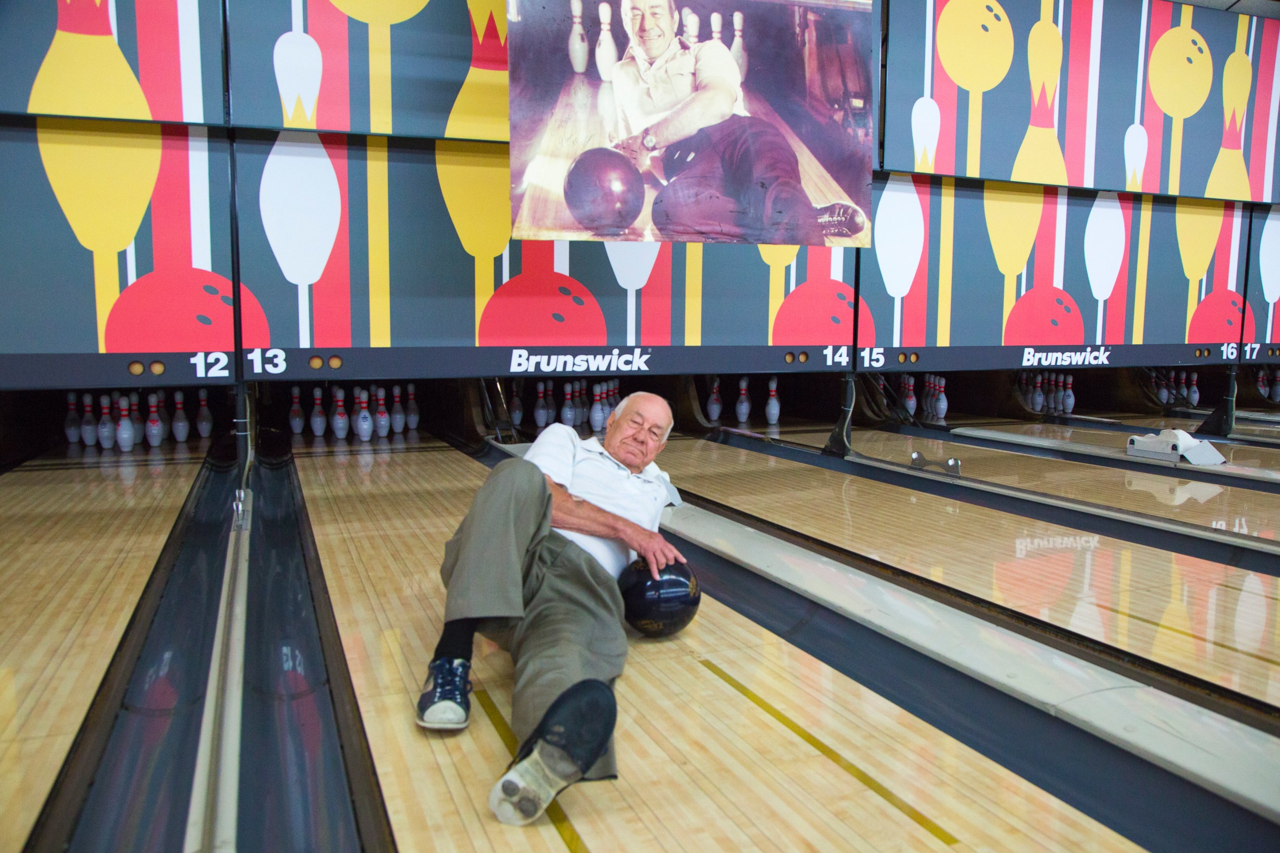 PHOTO: Glenn Allison posing on the lane he bowled a perfect 900 series in 1982 at La Habra 300 Bowl, La Habra, CA