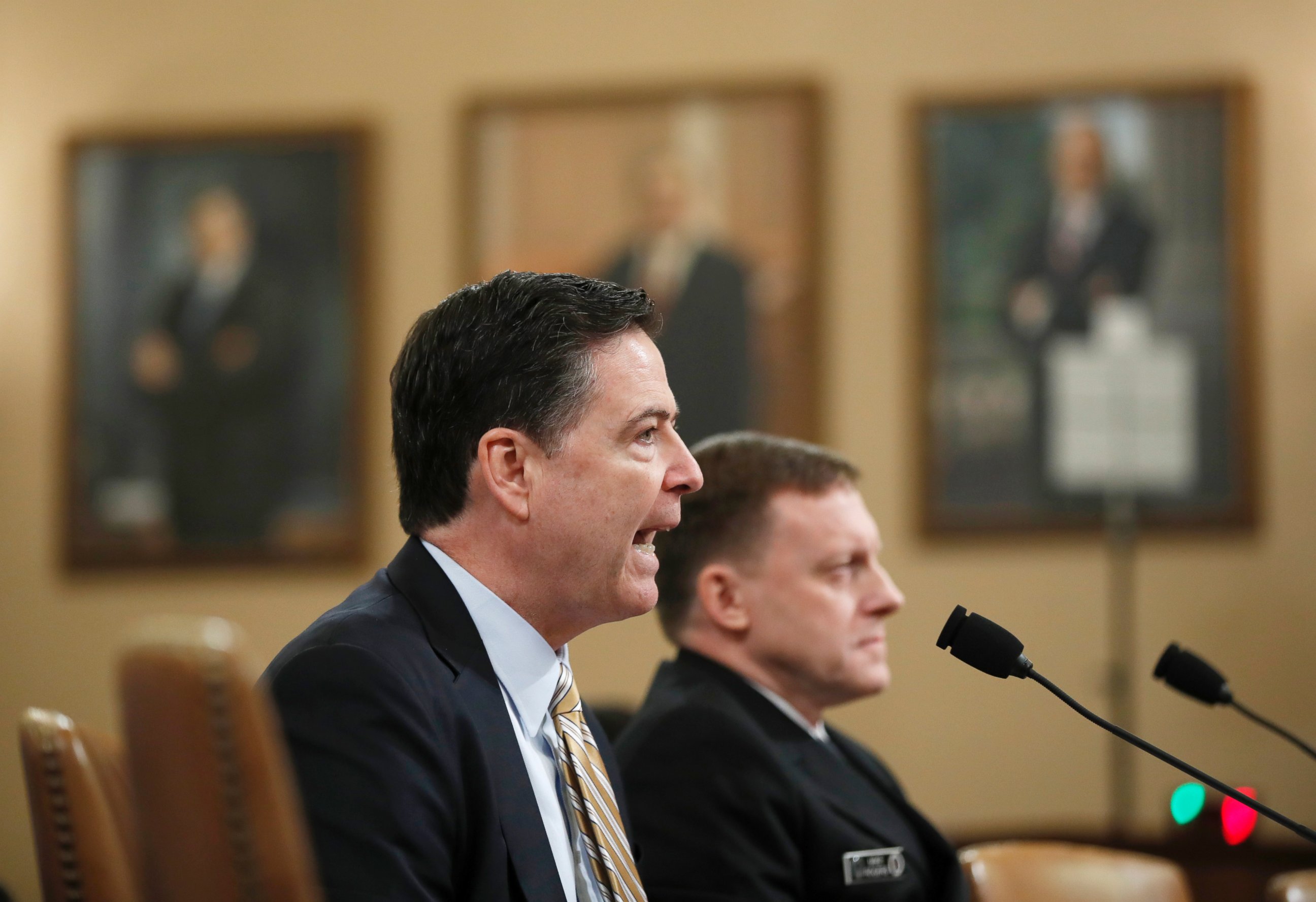 PHOTO: FBI Director James Comey, left, accompanied by National Security Agency Director Michael Rogers testifies on Capitol Hill in Washington, March 20, 2017.