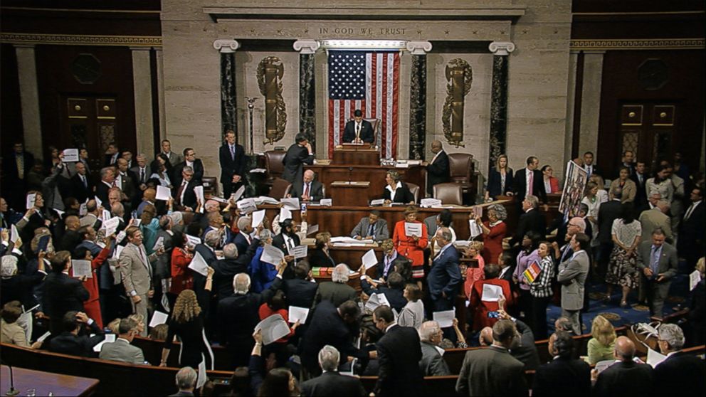 In this image from video provided by House Television, House Speaker Paul Ryan stands at the podium as he brings the House into session Wednesday night, June 22, 2016, in Washington.