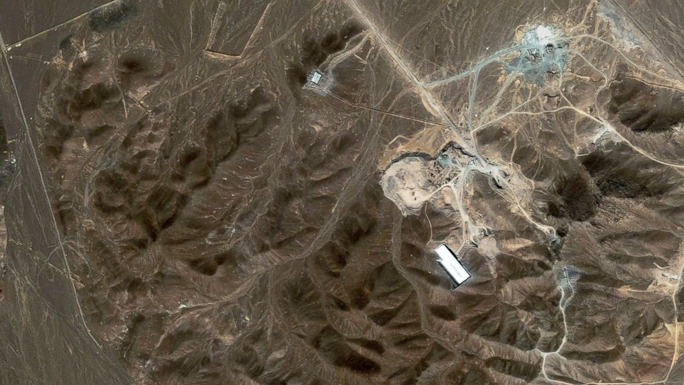 A file satellite image taken Sept. 27, 2009, provided by DigitalGlobe, shows a suspected nuclear enrichment facility under construction inside a mountain located north of Qom, Iran.