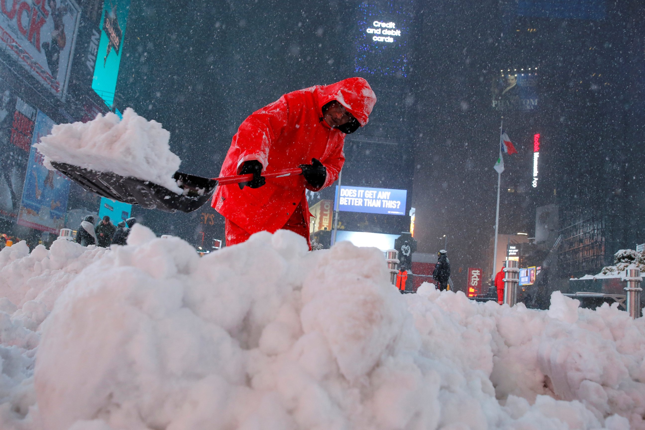 PHOTO: A worker clears snow in Times Square as snow falls in Manhattan, N.Y., March 14, 2017.