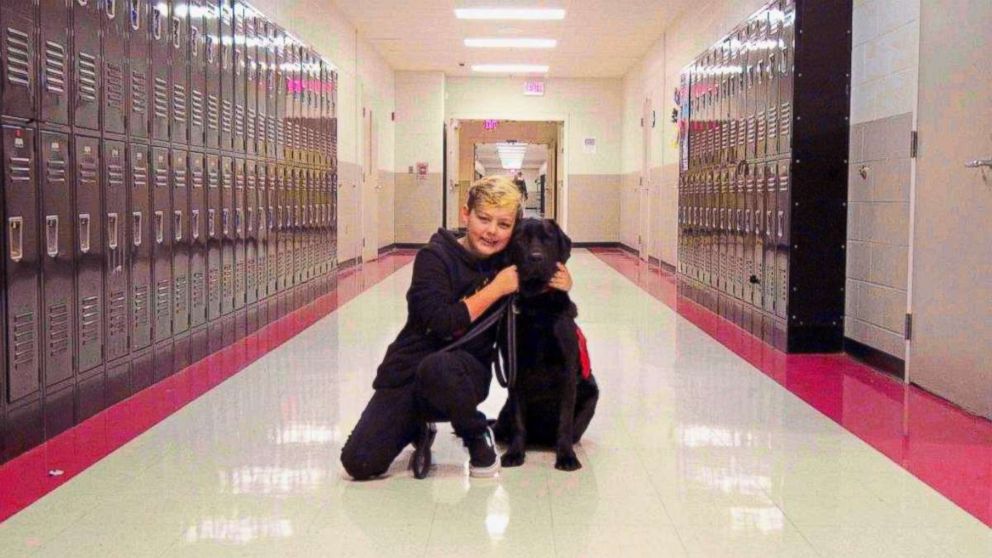 PHOTO: Eli Nichols takes his medical service dog, Einstein, to school with him every day in Arlington, Tenn.