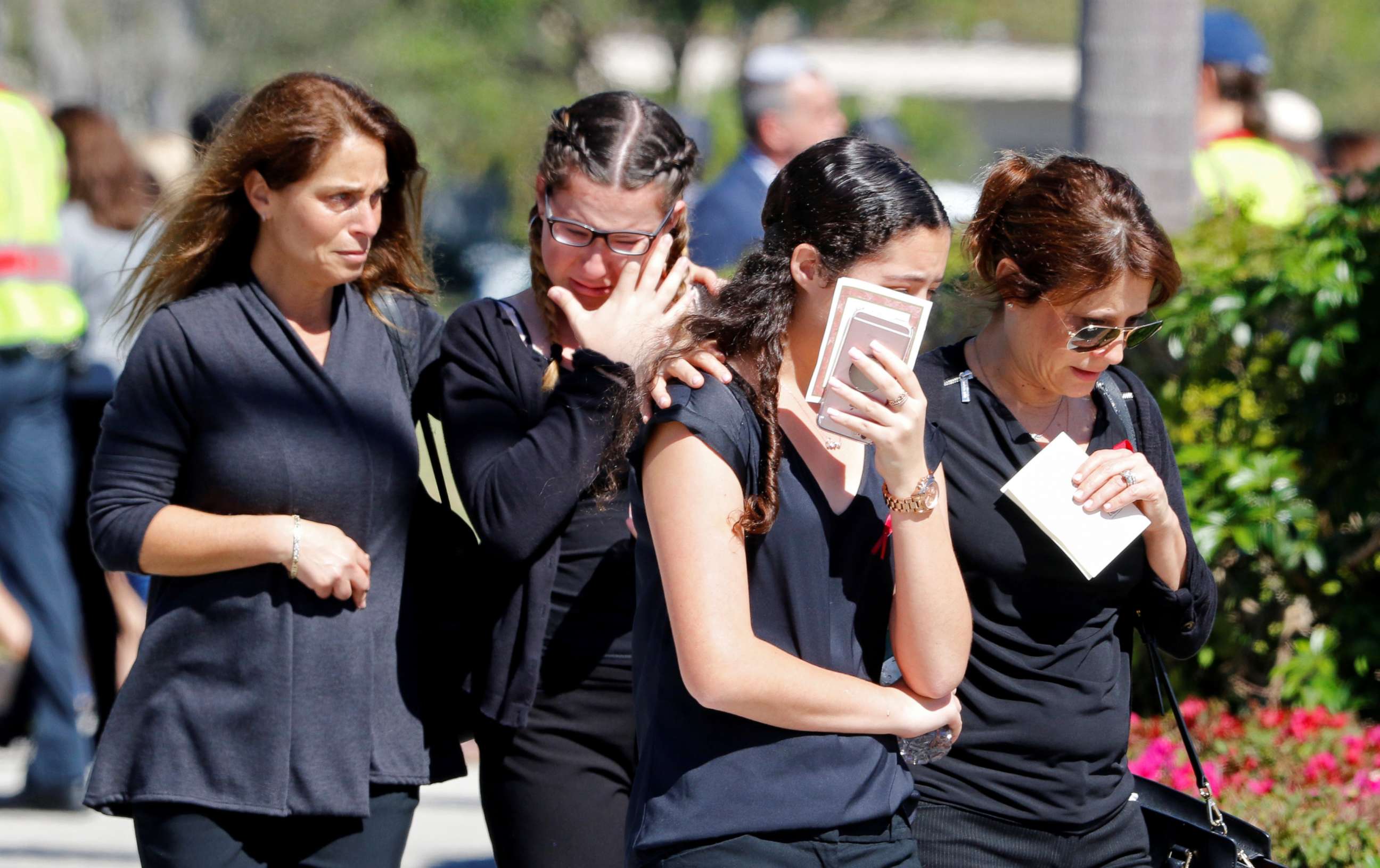 PHOTO: Mourners leave the funeral for Alyssa Aldaheff, 14, one of the victims of the school shooting, in North Fort Lauderdale, Fla., Feb. 16, 2018.