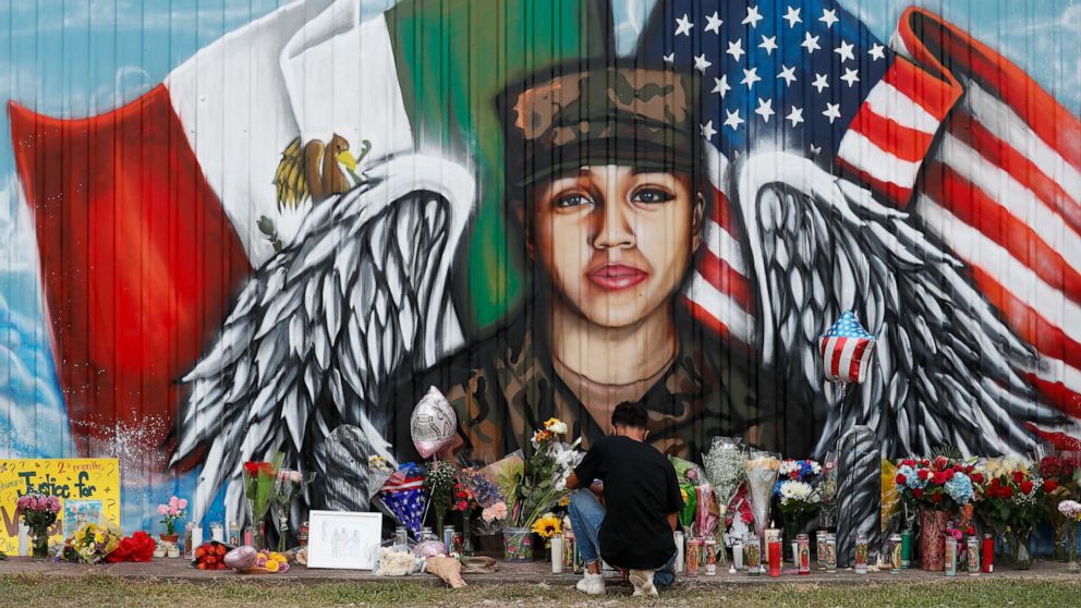 PHOTO: Juan Cruz, boyfriend of Army soldier Vanessa Guillen, kneels in front of a mural honoring her Sunday, July 5, 2020, in Houston.