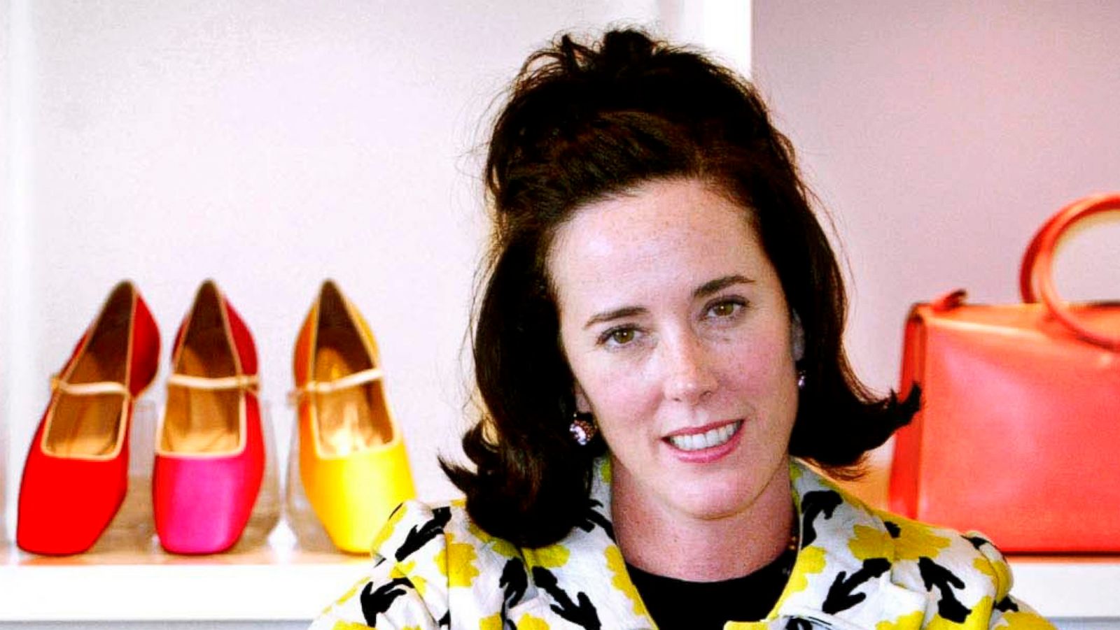 PHOTO: In this May 13, 2004 file photo, designer Kate Spade poses with handbags and shoes from her next collection in New York.