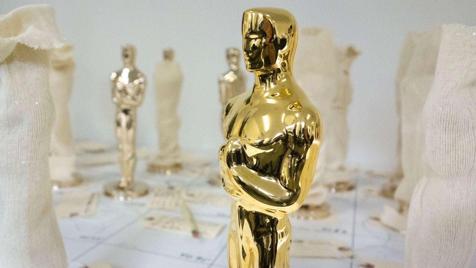 PHOTO: A 24-karat gold Oscar statuette stands among unfinished bronze Oscar statuettes Jan. 13, 2017 at Polich Tallix Foundary in Rock Tavern, N.Y.