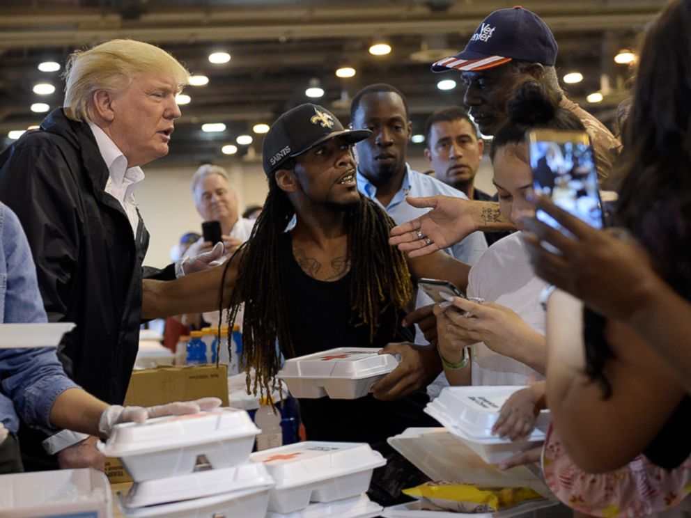 PHOTO: President Donald Trump and Melania Trump pass out food and meet people impacted by Hurricane Harvey during a visit to the NRG Center in Houston, Sept. 2, 2017.