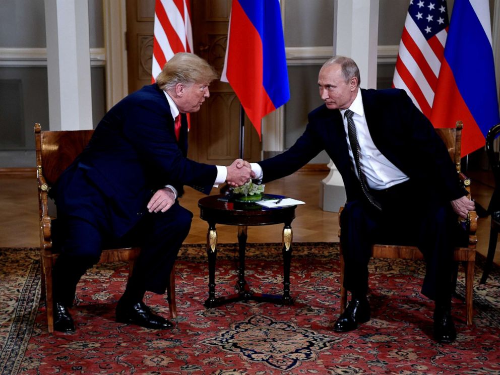 PHOTO: President Donald Trump and Russian President Vladimir Putin shake hands during their one-to-one meeting at the Presidential Palace in Helsinki, Finland, July 16, 2018.