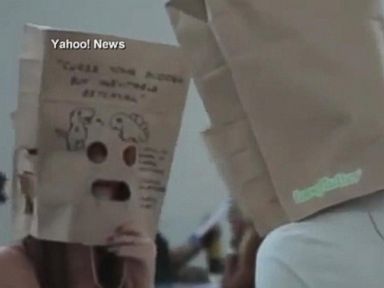 VIDEO: One speed dating company is trying to eliminate the shallowness of physical attraction by requiring all participants to wear paper bags over their heads.