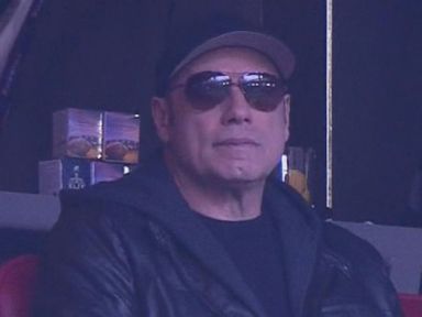 VIDEO: Celebrities like John Travolta and Mark Wahlberg attended Super Bowl XLIX.