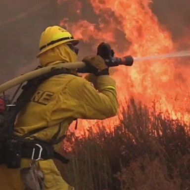 VIDEO: Strong winds fuel Southern California wildfires