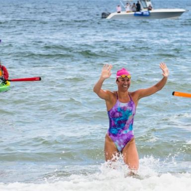 VIDEO: Olympic swimmer takes plunge in honor of late father