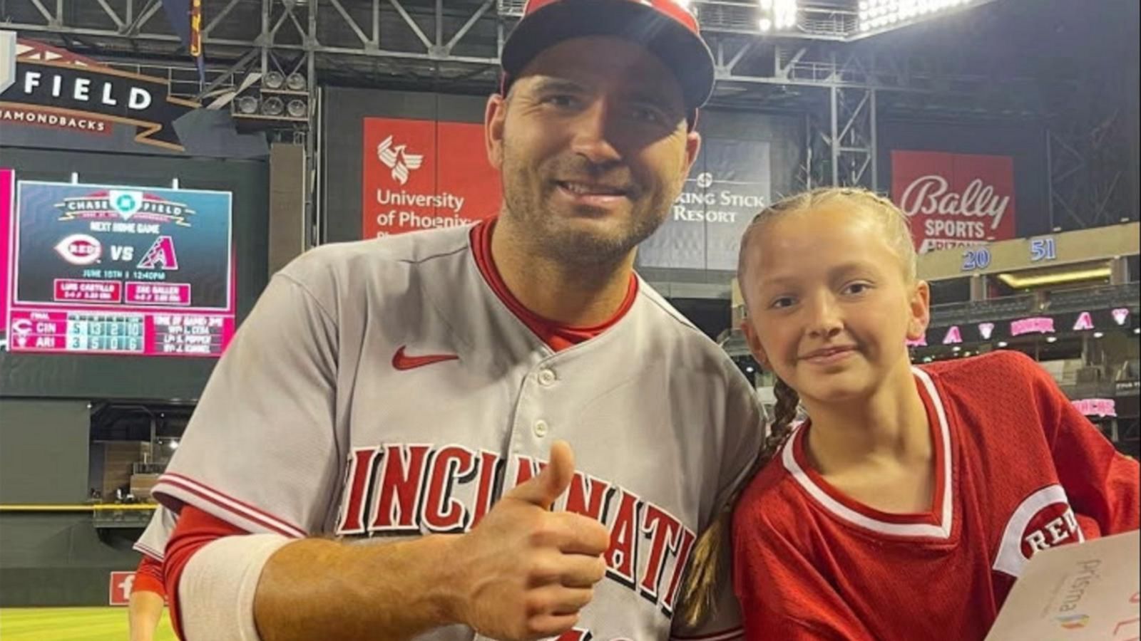 Watch: Reds star Joey Votto trades jersey for fan's shirt 