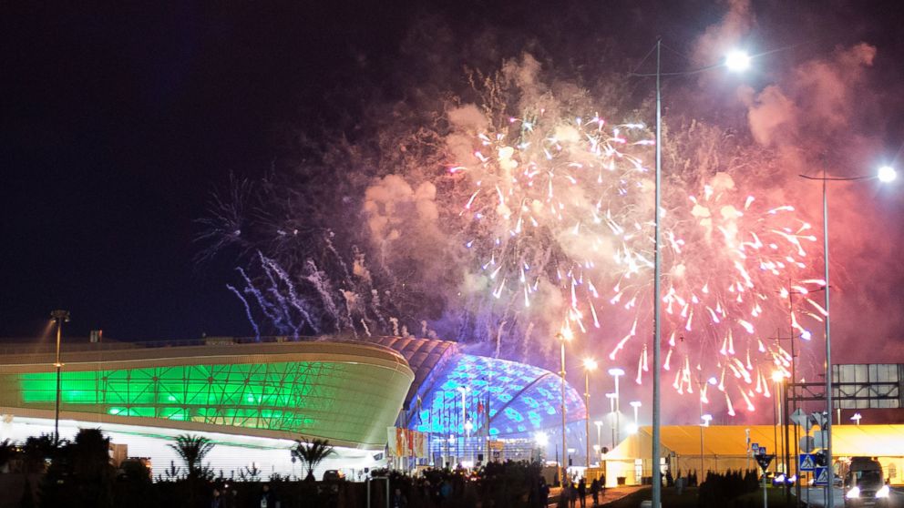 Fireworks are shot over Fisht Olympic Stadium, right, and Adler Arena, left, at the conclusion of a rehearsal for the opening ceremony at the 2014 Winter Olympics, Saturday, Feb. 1, 2014, in Sochi, Russia.