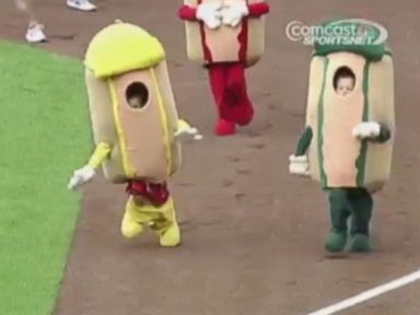 VIDEO: A boy dressed in a hot dog costume repeatedly falls during a race at Kauffman Stadium in Missouri.