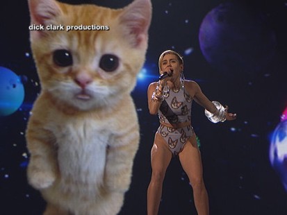 VIDEO: Mileys AMA performance of "Wrecking Ball" includes a lip-synching, crying feline in space.