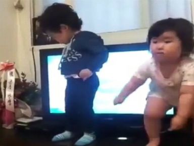 VIDEO: This cute toddler is seen squatting and shaking to the music in this viral video.