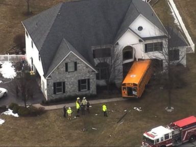 VIDEO: School Bus Driver Falls Unconscious Behind the Wheel; Bus Crashes Into a Home 