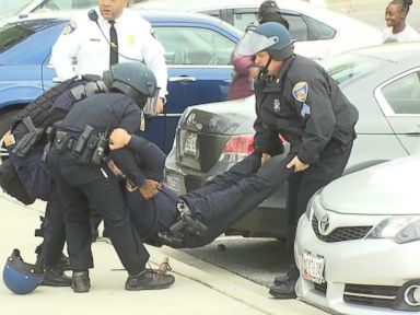 Several Police Officers Injured in Violent Baltimore Protests